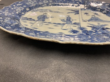 A large oval Chinese blue and white 'Romance of the Western Chamber' dish, Qianlong